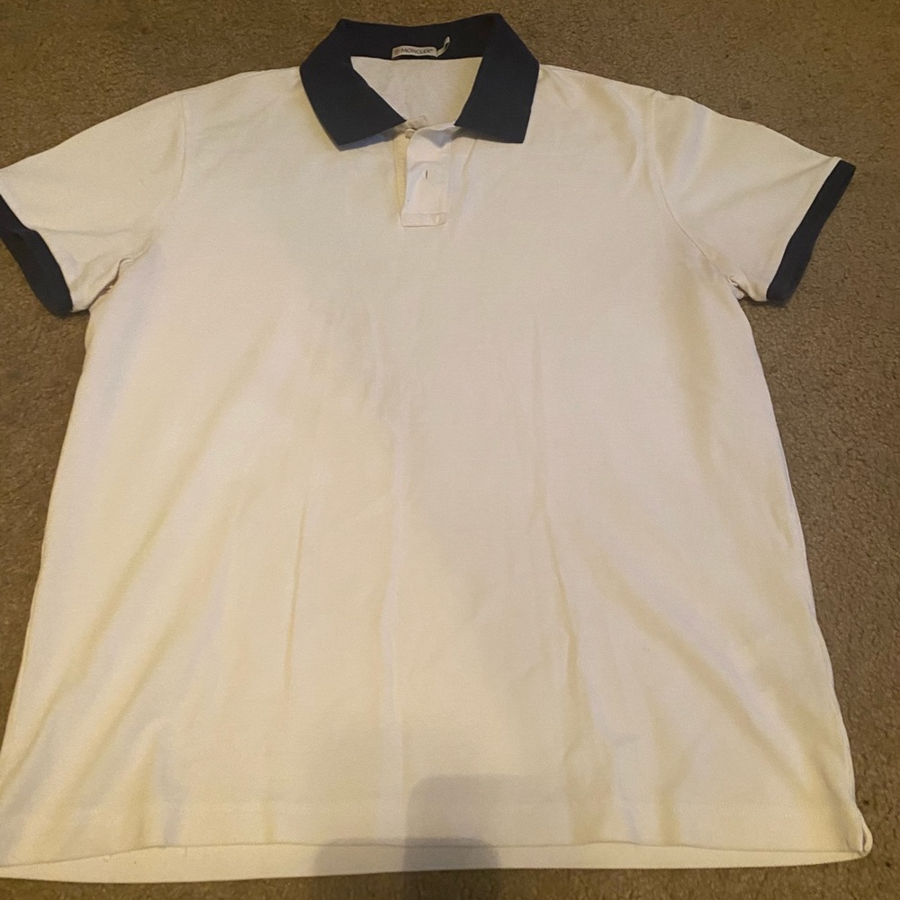 Moncler polo shirt with blue collar very nice and bright white